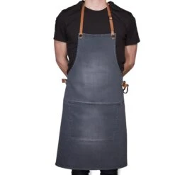 Dutchdeluxes Canvas BBQ Apron In Washed Grey -De Buyer Store dutch deluxes canvas bbq apron male model washed grey